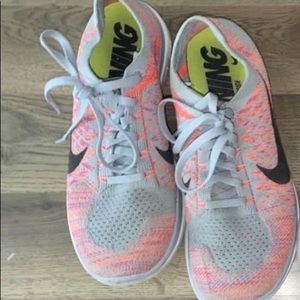 Nike FlyKnit running shoes size 10